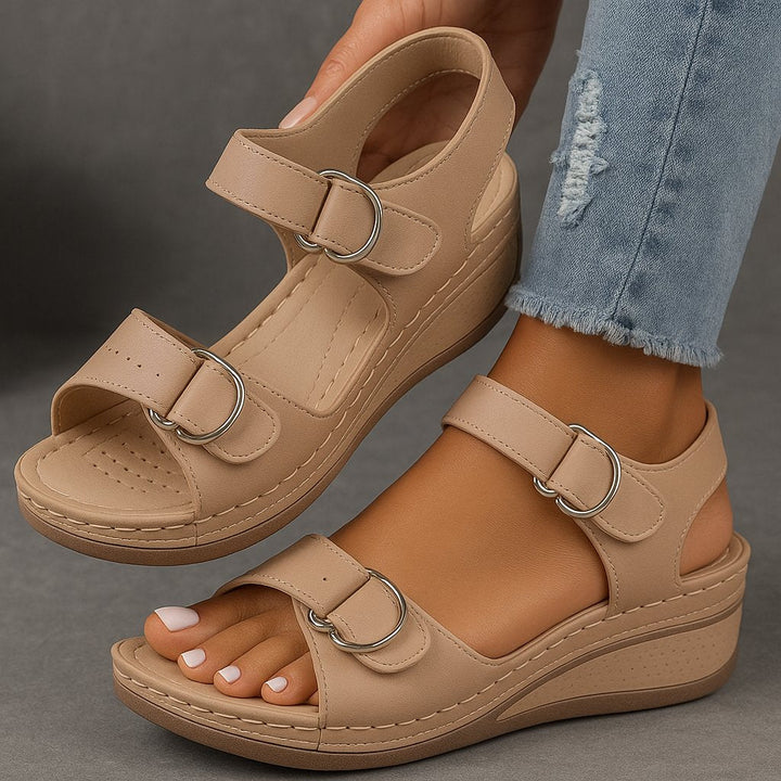 Orthopedic women's wedge sandals with arch support, designed for comfort and stylish summer footwear.