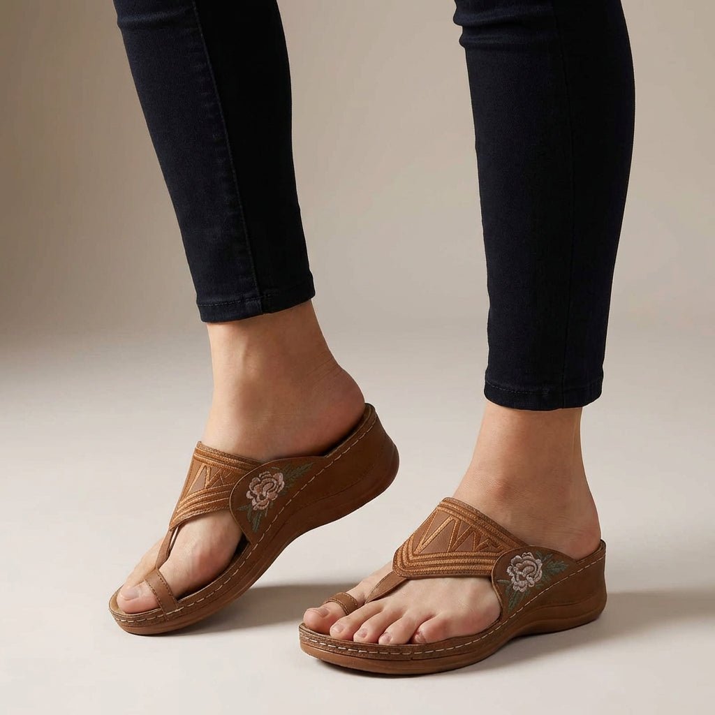 Women's orthopedic wedge sandals with elegant floral embroidery and arch support for summer comfort.