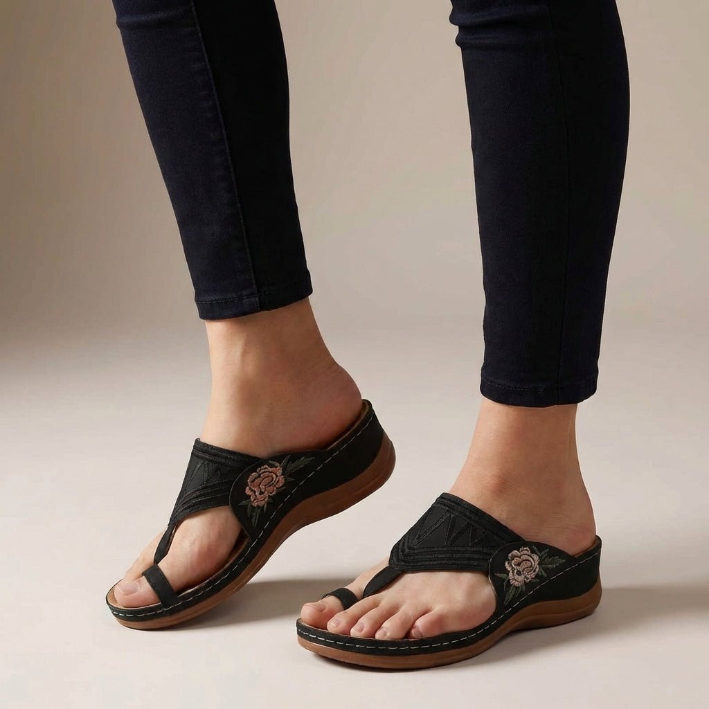 Comfortable thong wedge sandals for women, featuring intricate floral embroidery and orthopedic support.