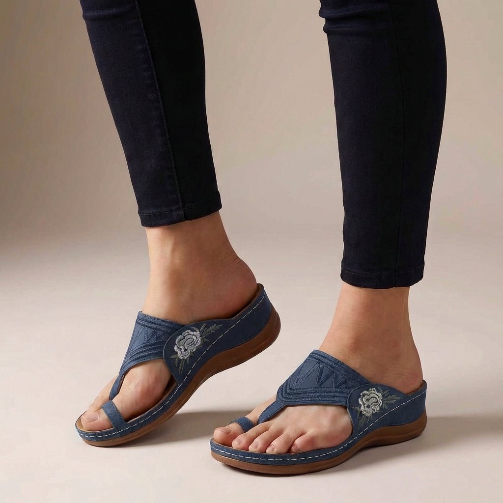 Fashionable women's wedge sandals with beautiful floral embroidery, perfect for casual summer wear & comfort.