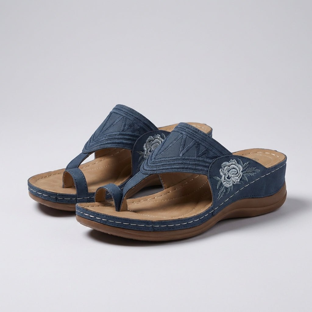Casual women's orthopedic wedge sandals. Floral embroidered thong design provides comfort & arch support.