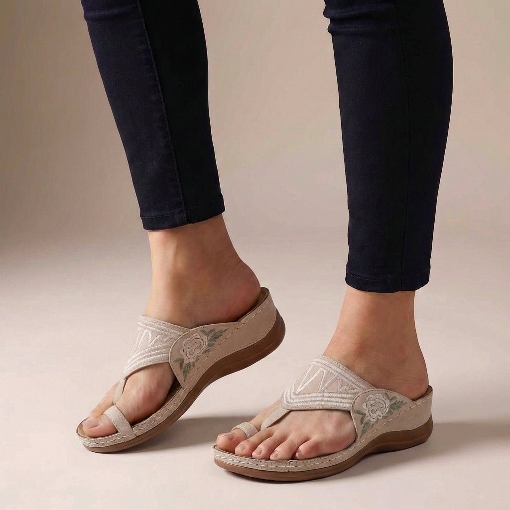 Vacation-ready women's floral embroidered thong wedge sandals with orthopedic comfort and arch support.