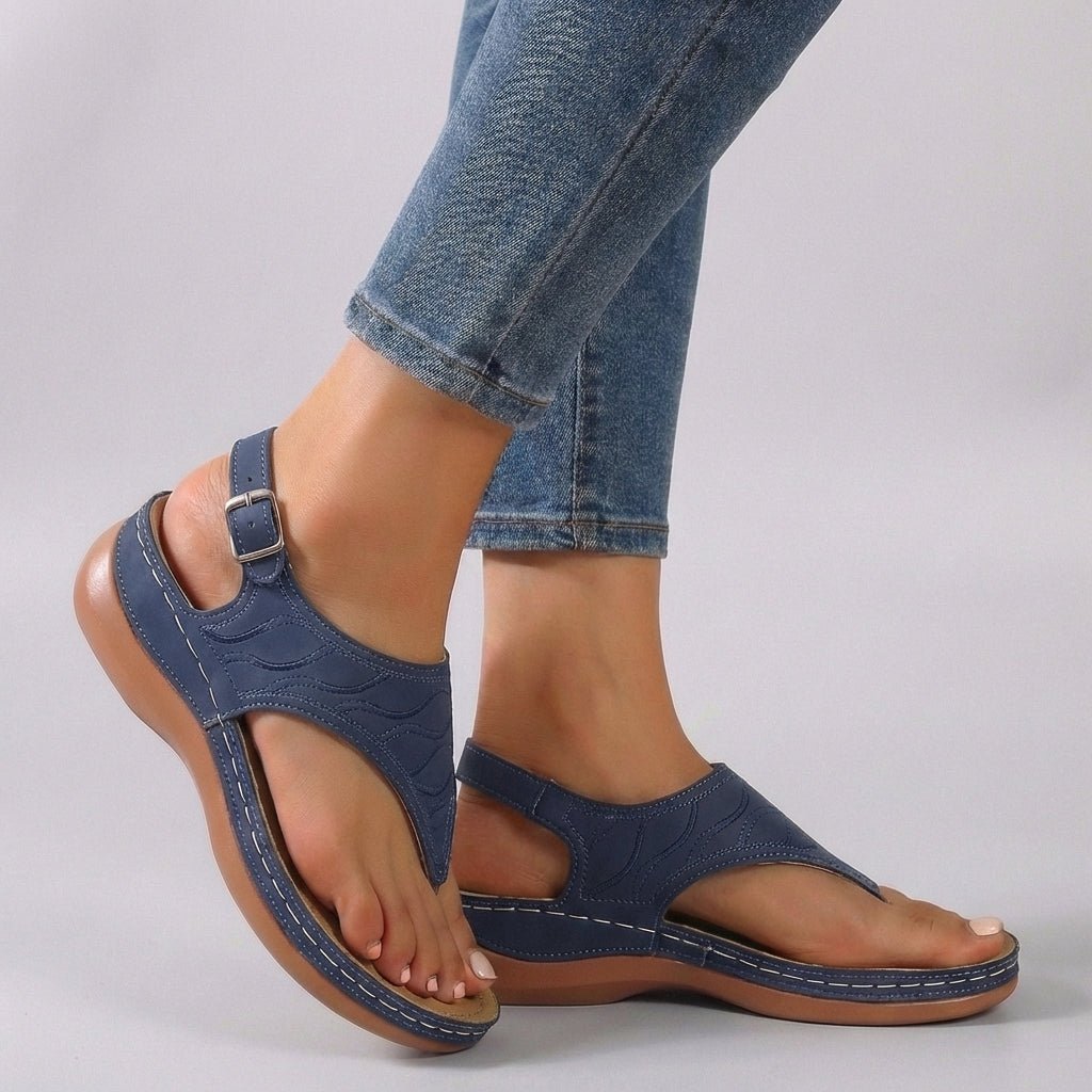 Comfortable women's orthopedic wedge sandals featuring an embroidered ankle strap, ideal for foot support and style.