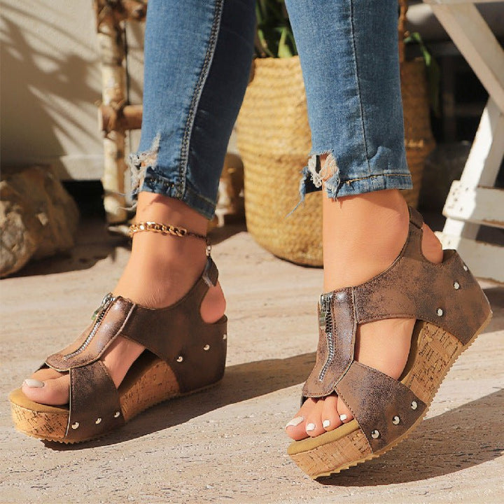 Supportive women's orthopedic wedge sandals, zip-front platform for all-day comfort footwear.