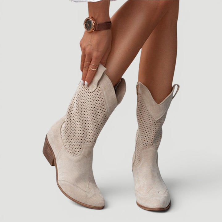 Women's orthopedic western cowboy boots. Stylish mid-calf comfort footwear with a unique perforated design.