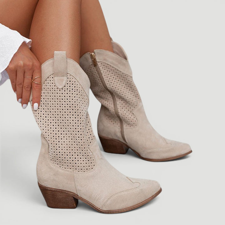 Perforated mid-calf women's western boots. Orthopedic cowboy boots offering comfort & unique style.