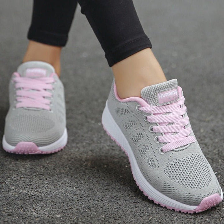 Orthopedic lace-up trainers for women, designed for comfort and wide feet.
