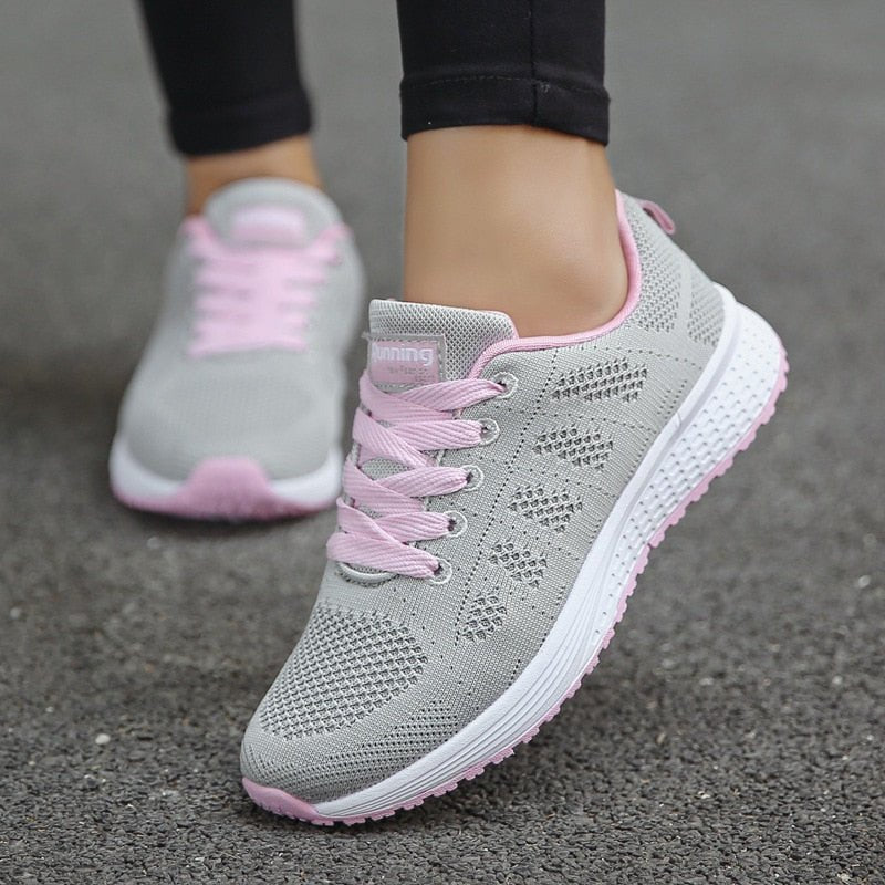 Lace-up wide-fit orthopedic trainers for women, perfect for foot pain and comfort.