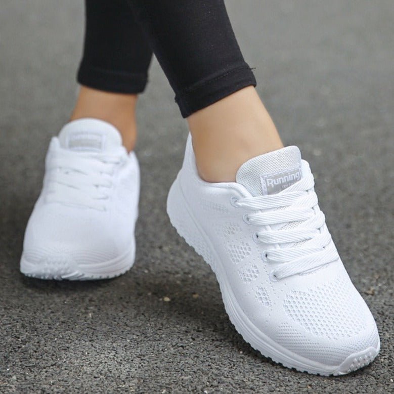 Comfortable lace-up orthopedic trainers for women, ideal for plantar fasciitis relief.