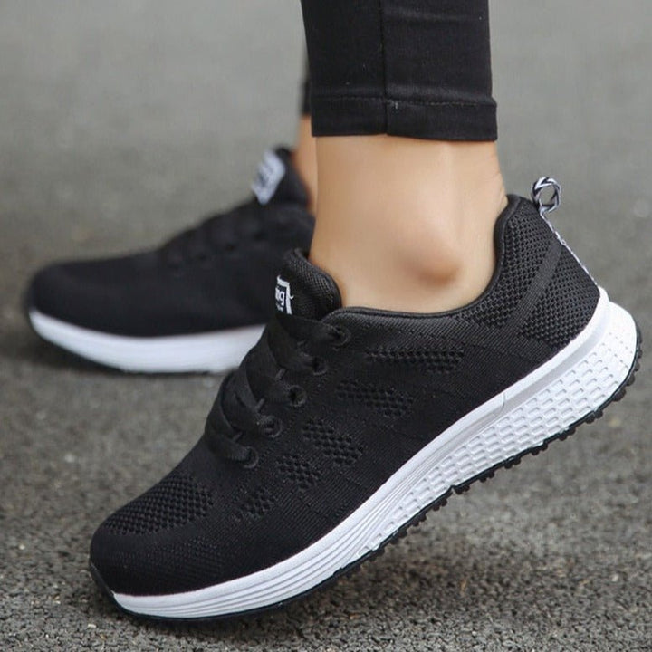 Slip-resistant wide-fit walking trainers for women, orthopedic and with arch support.