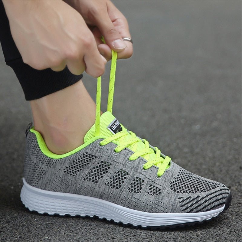 Lace-up wide-fit women's trainers, orthopedic design provides superior foot support.