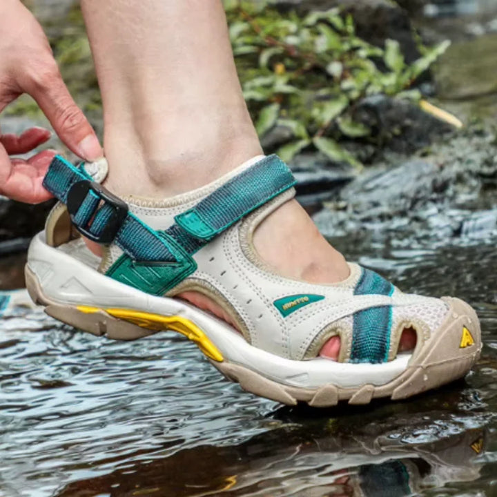 Women's adventure walking sandals, closed-toe and water-friendly, perfect for outdoor summer activities.