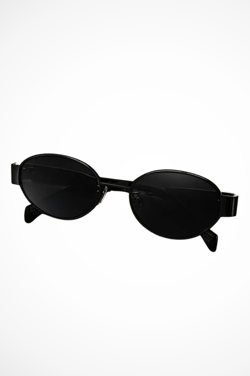 Fashionable women's oval sunglasses with slender metal frames, perfect for sunny days.