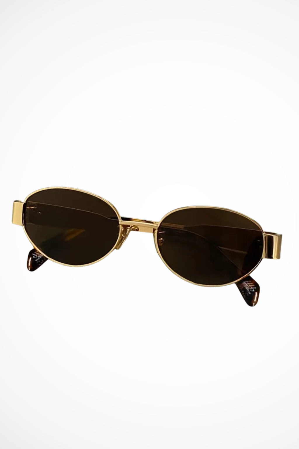 Sleek women's oval metal frame sunglasses with dark tinted lenses, lightweight and stylish.