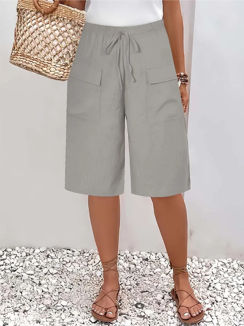 Women's oversize casual trousers with delicate lace trim, perfect for comfortable and stylish daily wear.