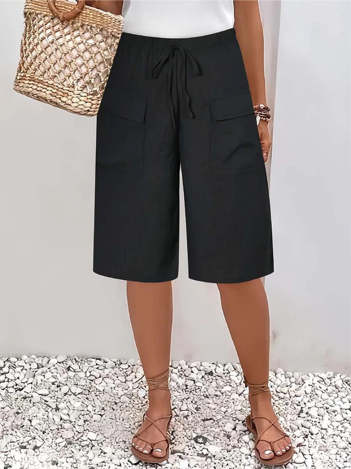 Elegant women's wide leg loose pants featuring beautiful lace details, ideal for a relaxed yet chic look.