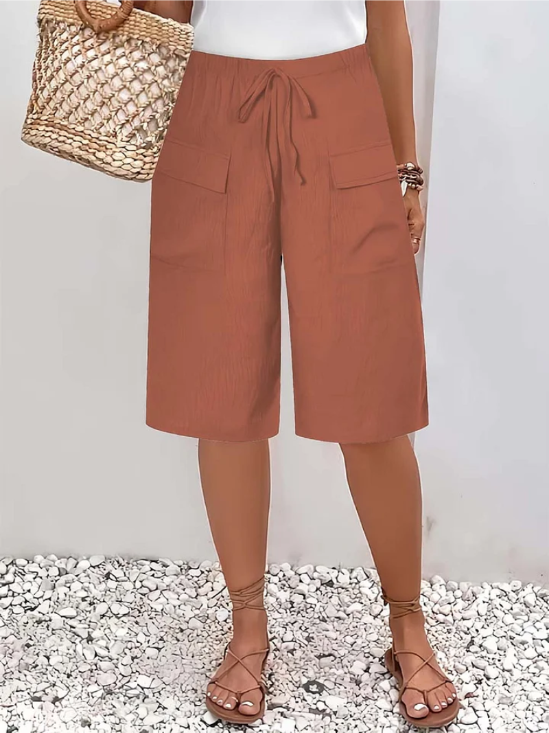 Classic women's casual wide leg pants with intricate lace trim, offering a comfortable and stylish oversize fit.