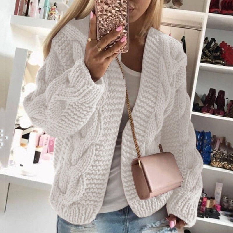 Cozy Chunky Knit Cardigan for women in an oversize open style. A stylish long sleeve sweater for cool days.