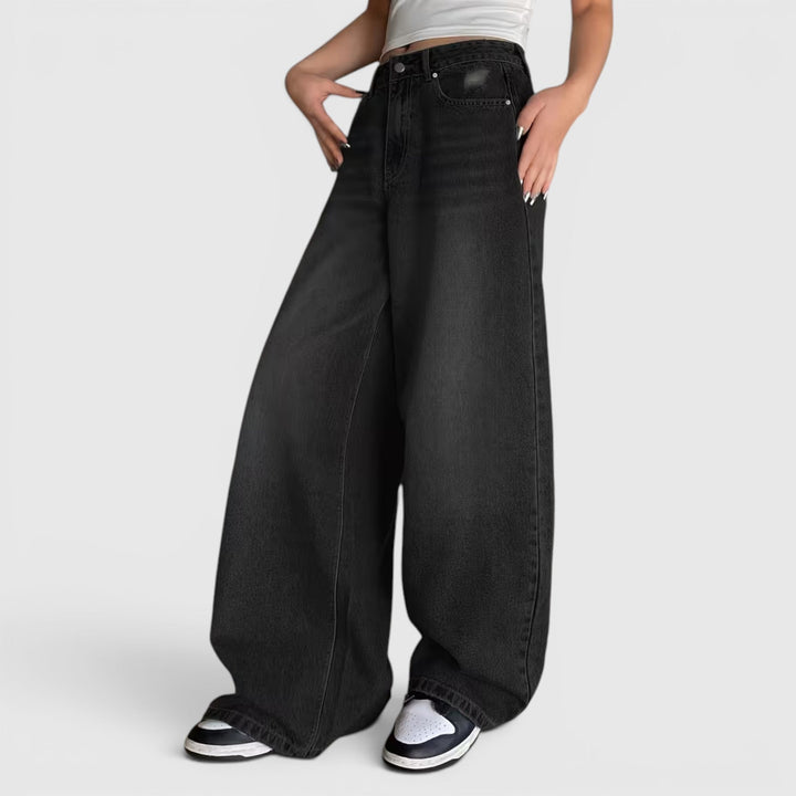 High waist women's baggy pants, loose fit, floor length for a trendy, relaxed street style look.