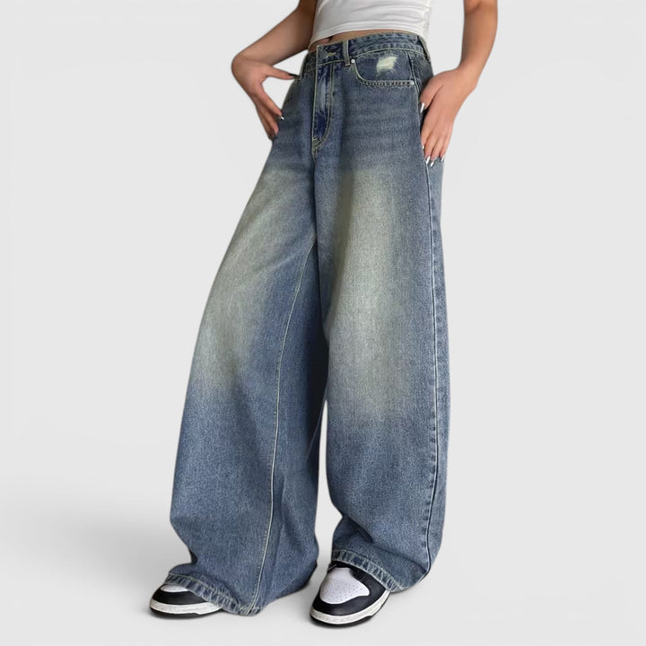Casual women's wide leg pants, oversized, floor length, offering a comfortable, relaxed fit.