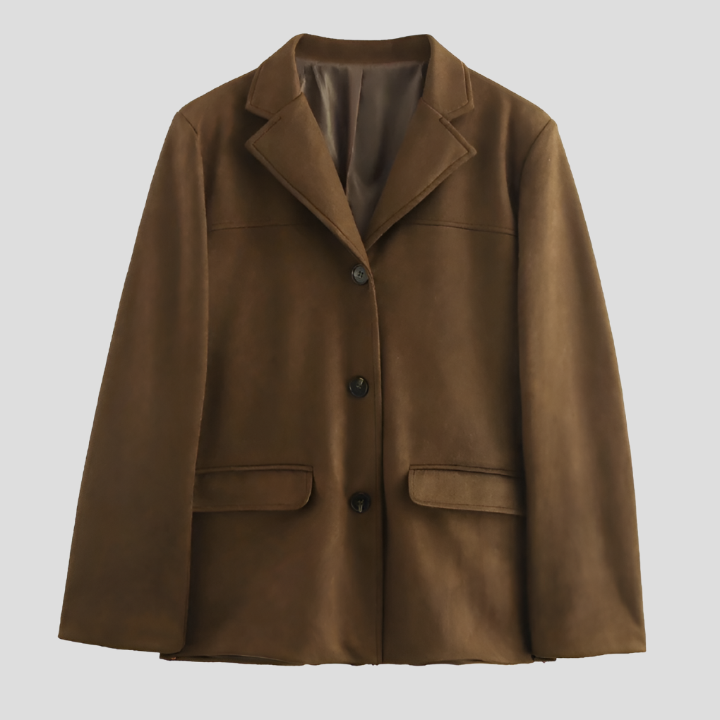Women's oversized brown trench coat with wide lapel. Elegant long jacket, perfect for fall fashion.