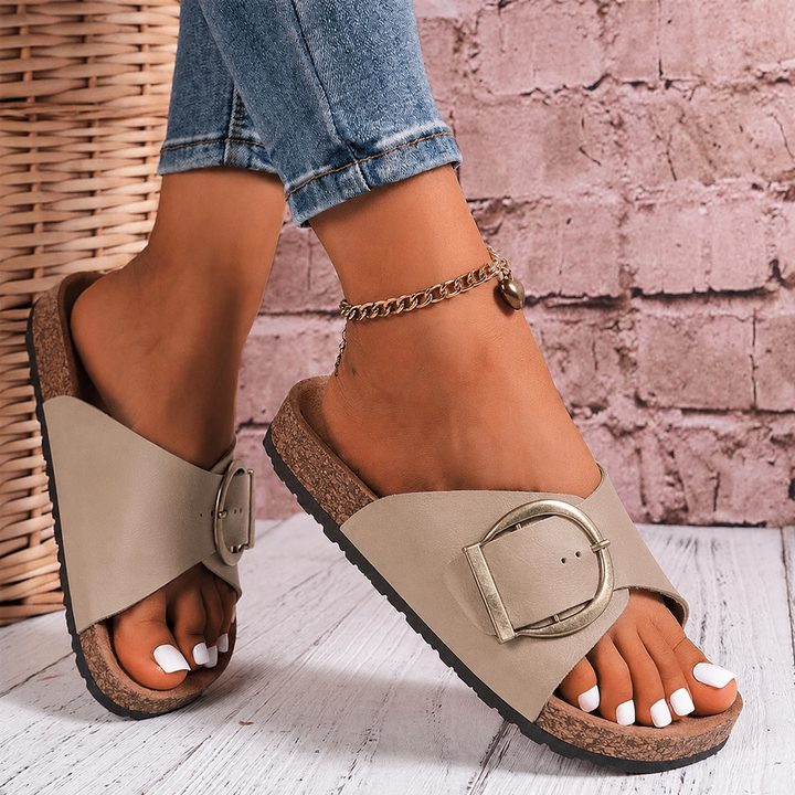 Women's oversized buckle slide sandals, perfect for casual summer wear & vacation. Comfortable slip-on design.