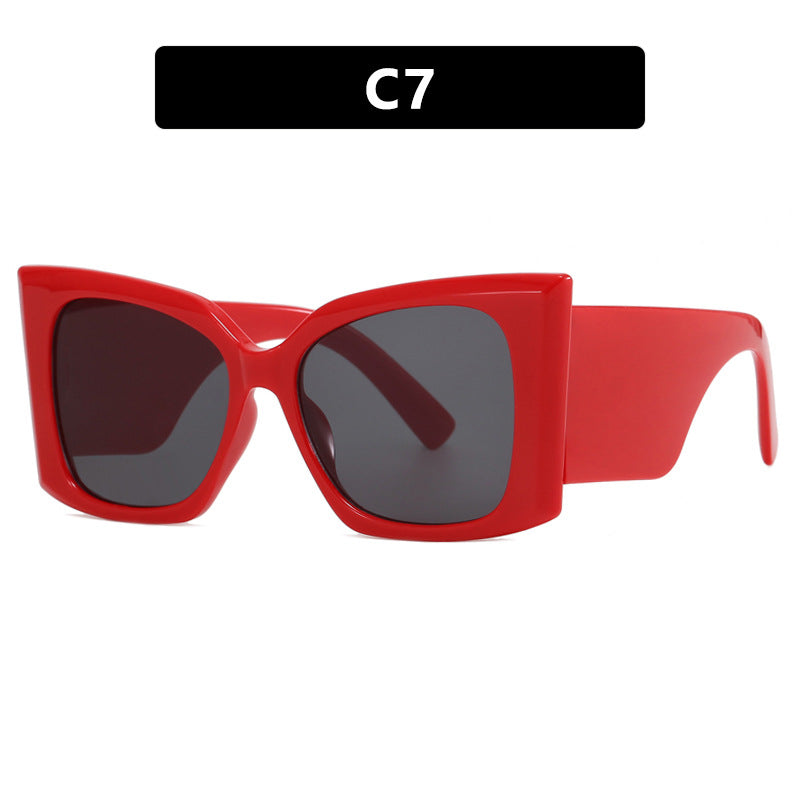 Fashionable women's oversized cat-eye sunglasses, wear for UV protection and summer style.