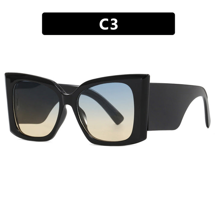 Glamorous oversized cat-eye sunglasses, perfect summer accessory for women, UV protected fashion.