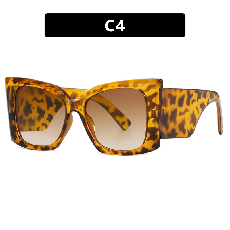 Women's oversized cat-eye sunglasses, essential UV protective fashion eyewear for ladies.