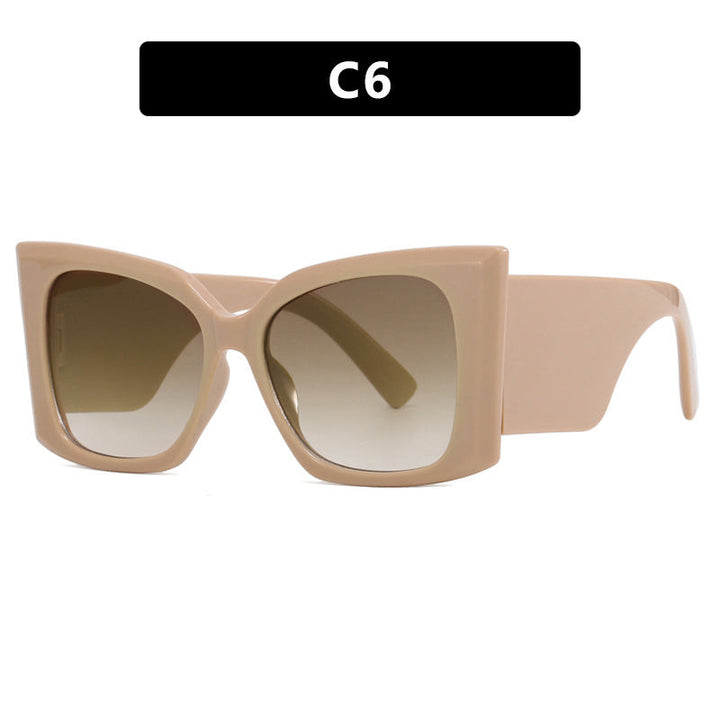 Stylish women's cat-eye sunglasses, oversized & chic for a glamorous look, UV protected.