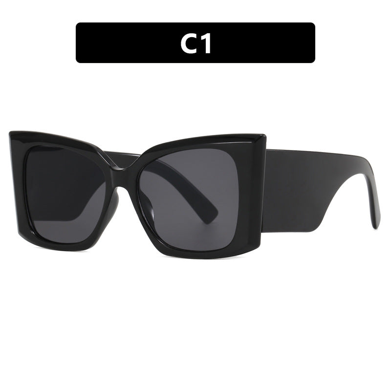 UV protection oversized cat-eye sunglasses for women, fashionable summer eyewear.