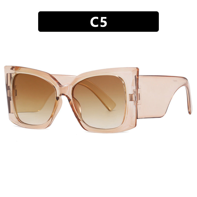 Ladies' oversized cat-eye sunglasses, chic fashion eyewear, UV protection, summer accessory.