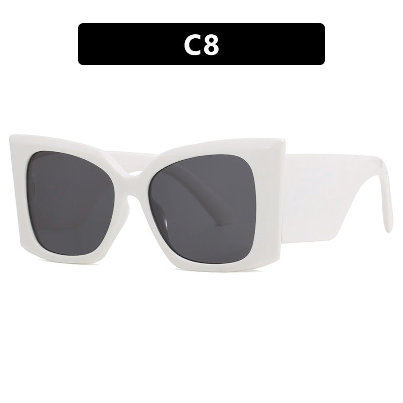 Women's oversized cat-eye sunglasses with a stylish plastic frame, UV protection eyewear.