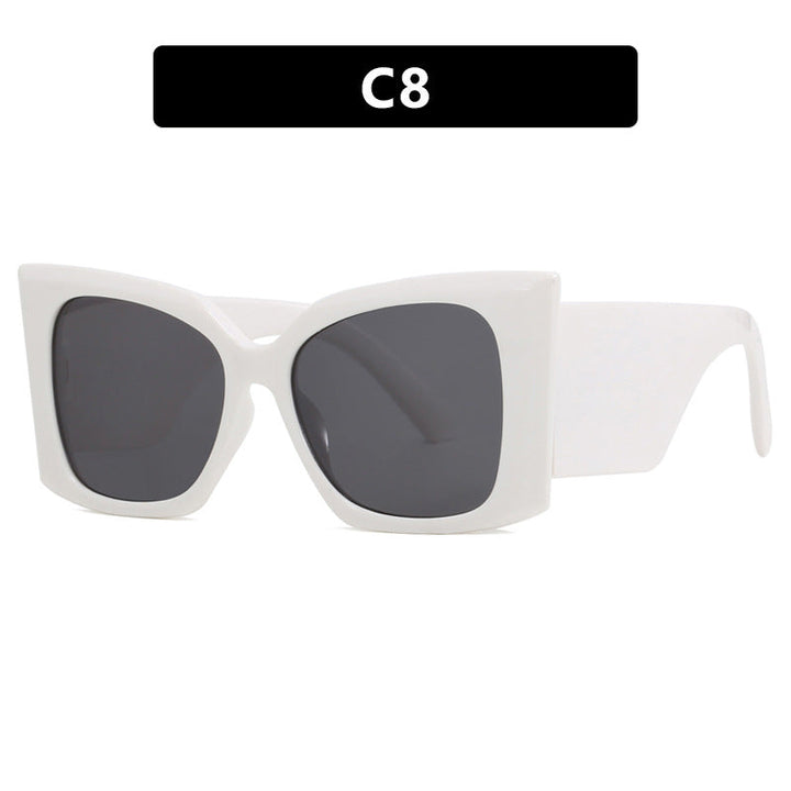Women's oversized cat-eye sunglasses with a stylish plastic frame, UV protection eyewear.