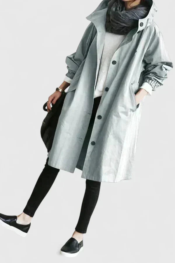 Hooded women's oversized coat, comfortable & stylish, great for casual autumn/winter wear.