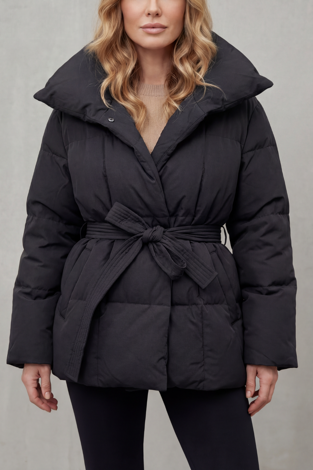 Full-length women's oversized collar puffer coat, a warm winter essential designed for elegant cold weather.