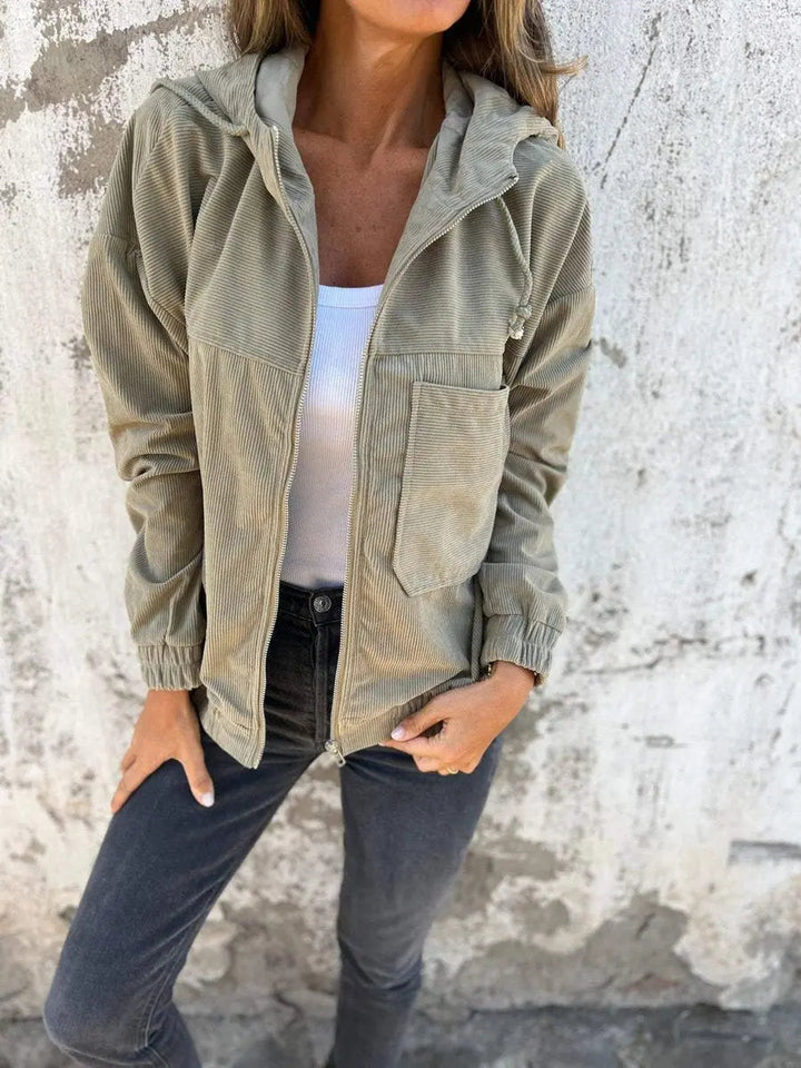 Relaxed fit women's oversized hooded zip-up corduroy jacket, a stylish quilted piece for everyday casual wear.