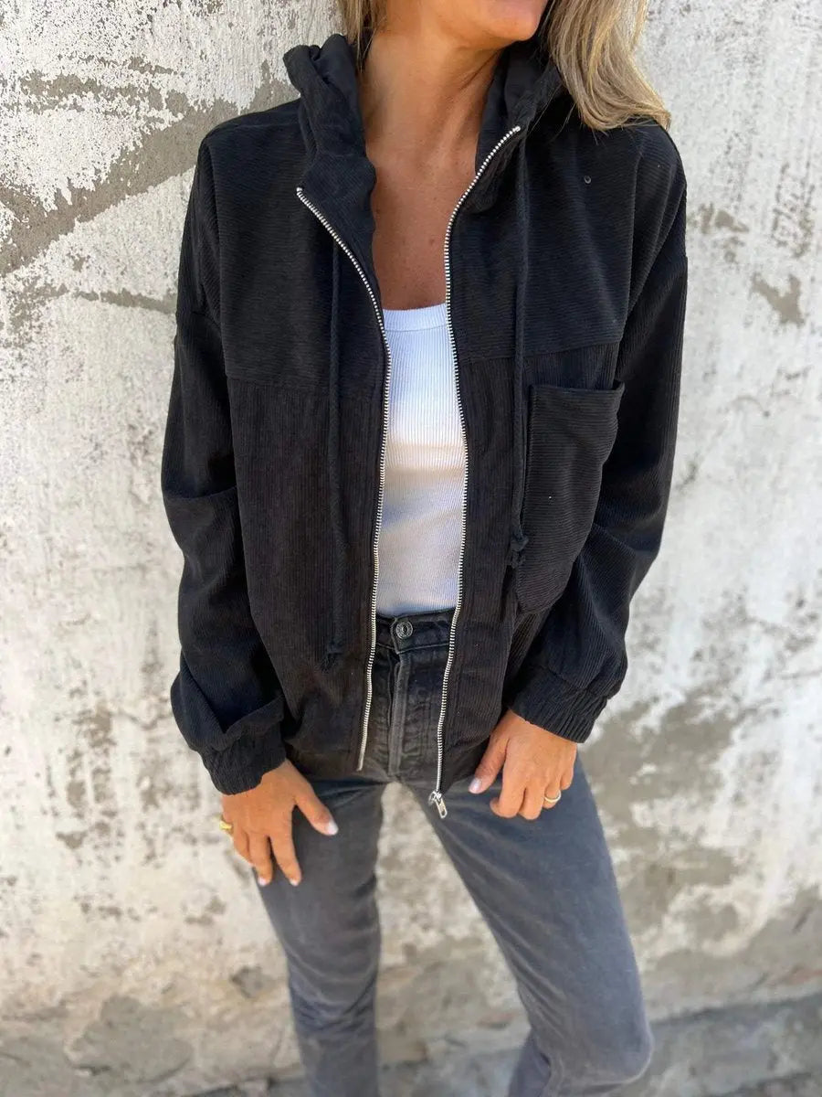 Comfortable women's oversized corduroy zip-up jacket, hooded & quilted for a relaxed, casual spring/fall look.