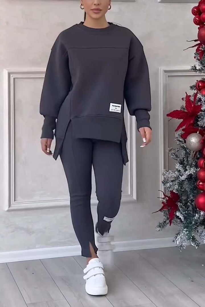 Relaxed fit women's two-piece loungewear set, perfect for everyday comfort. Oversized long sleeve top & cozy pants.