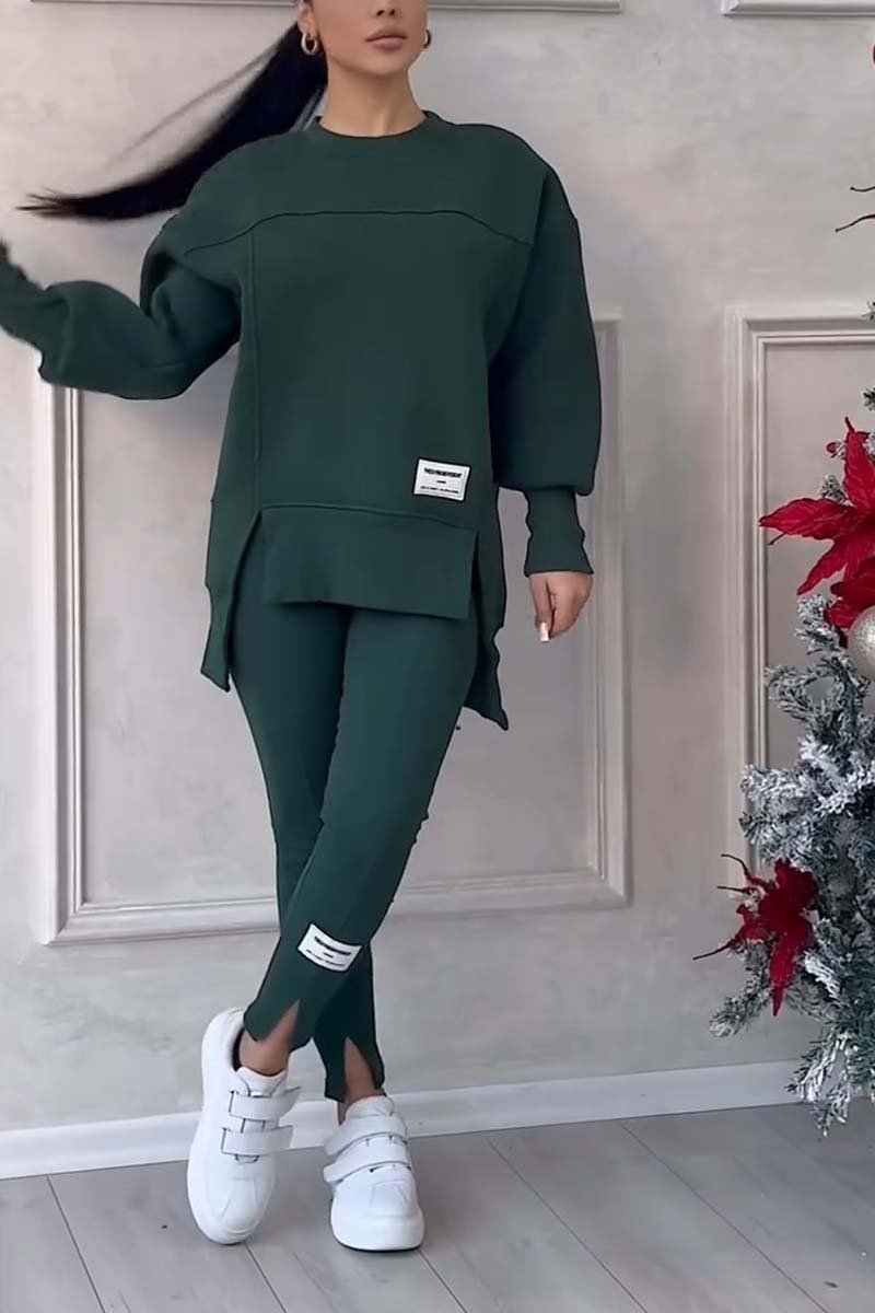 Stylish women's oversized long sleeve crew neck top, part of a comfy loungewear set. Ideal for casual autumn fashion.