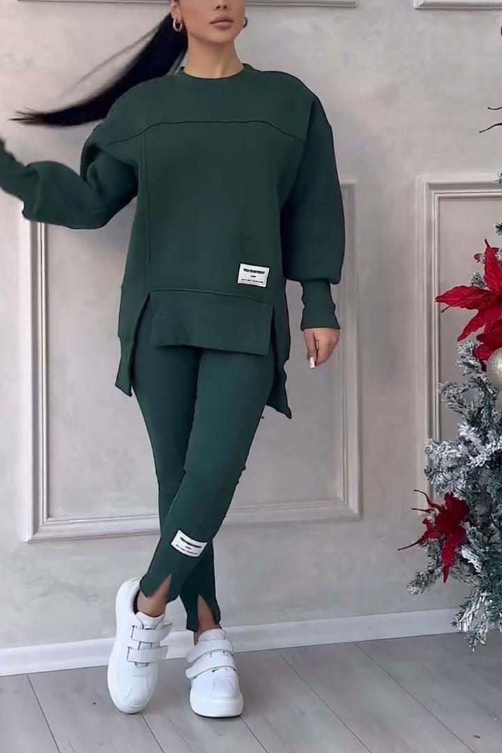 Stylish women's oversized long sleeve crew neck top, part of a comfy loungewear set. Ideal for casual autumn fashion.