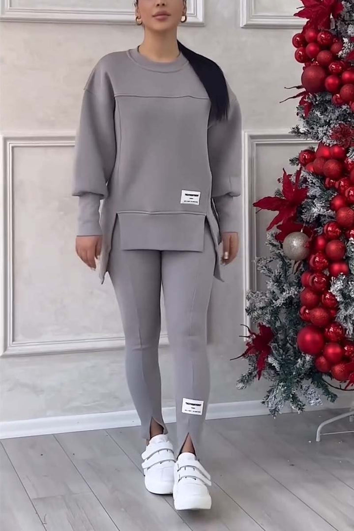 Versatile women's casual loungewear set. Oversized long sleeve crew neck top & comfy bottoms for everyday style.