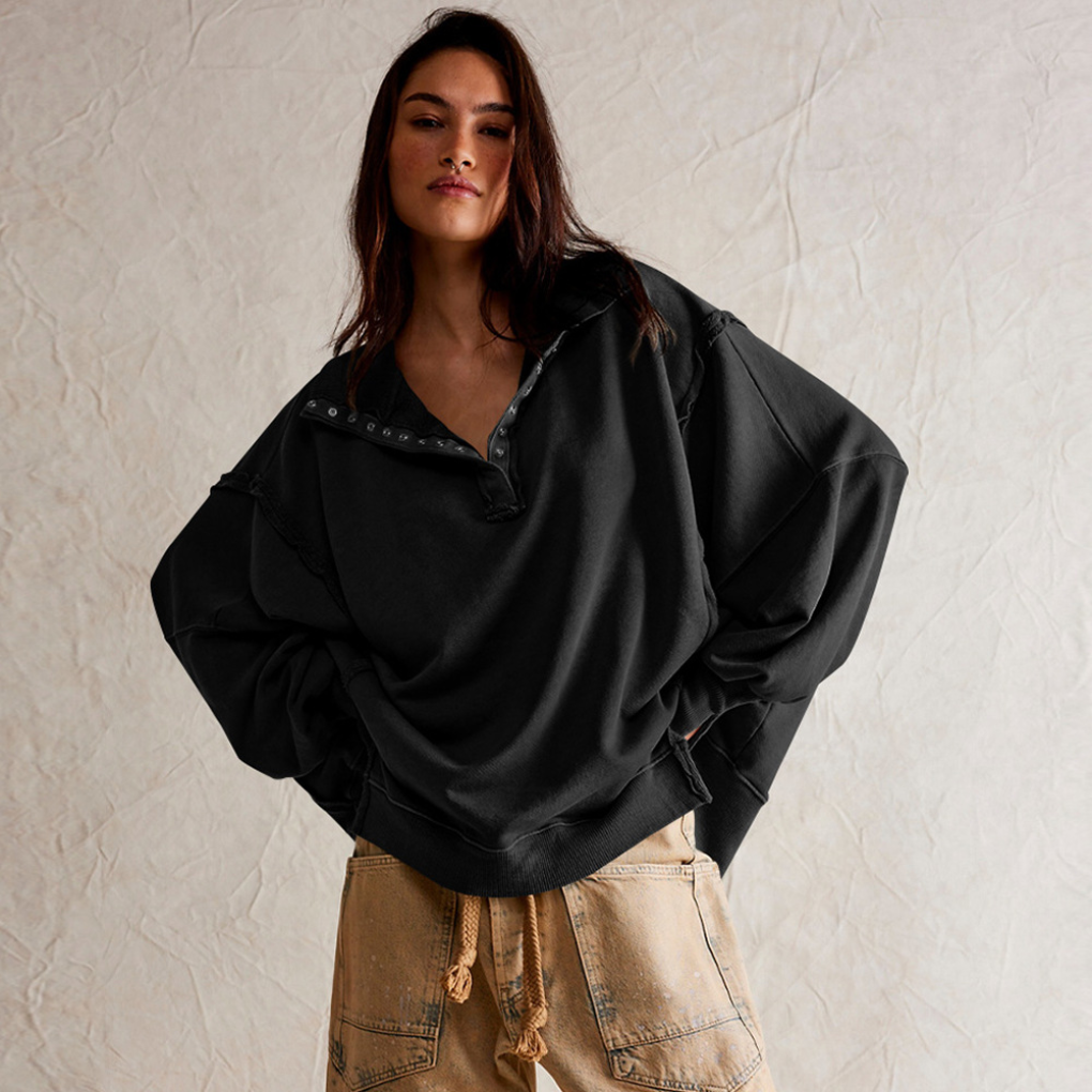 Women's oversized Henley pullover. Relaxed fit, long sleeve casual top for comfort & style.