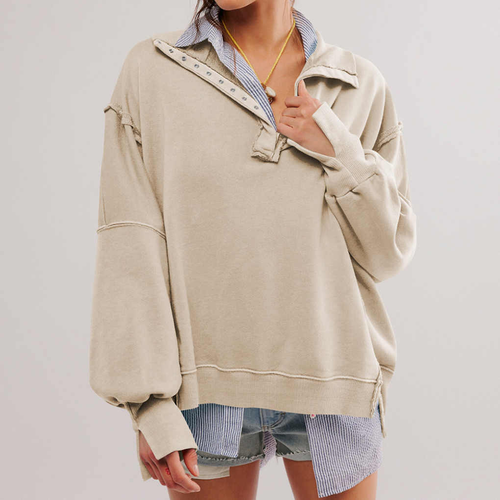 Versatile women's oversized Henley pullover. Relaxed fit, long sleeve top, perfect for layering.