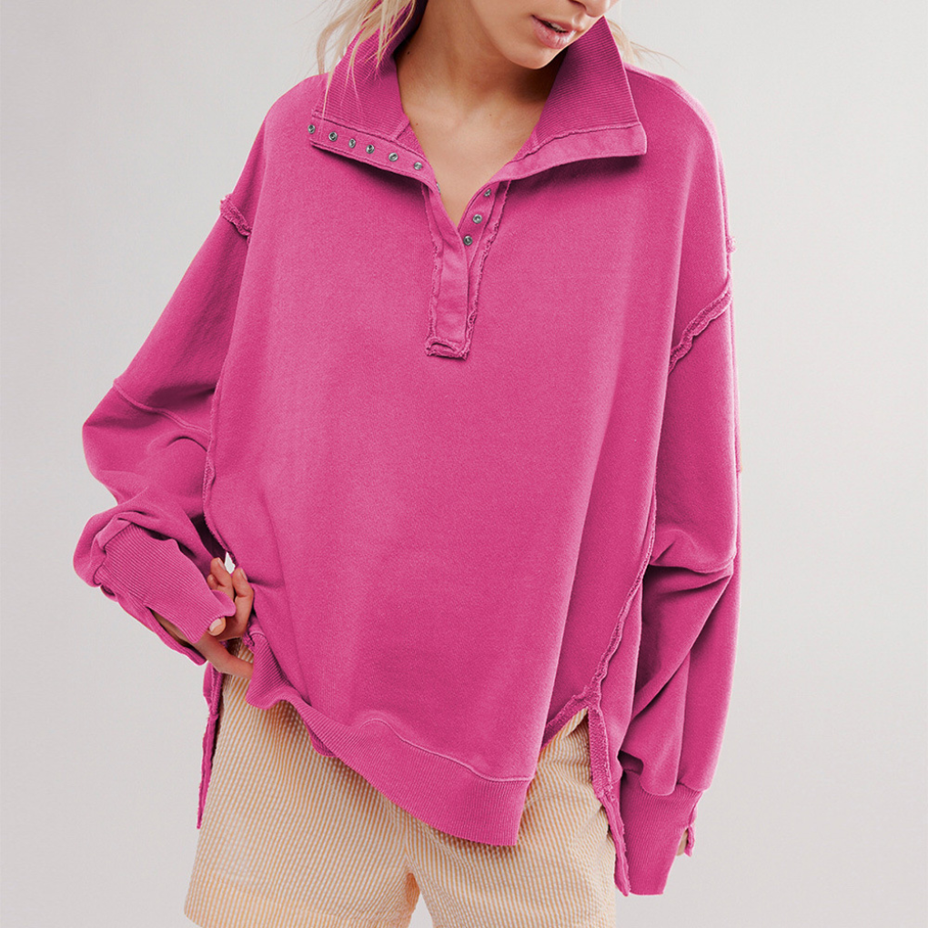 Comfortable women's oversized Henley pullover. Relaxed fit, long sleeve casual top, versatile for everyday.
