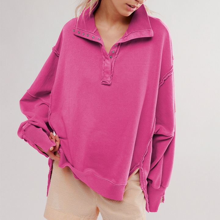 Comfortable women's oversized Henley pullover. Relaxed fit, long sleeve casual top, versatile for everyday.
