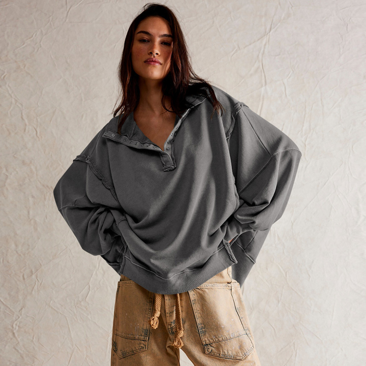 Women's casual oversized Henley pullover. Relaxed fit, long sleeve top, great for stylish layering.