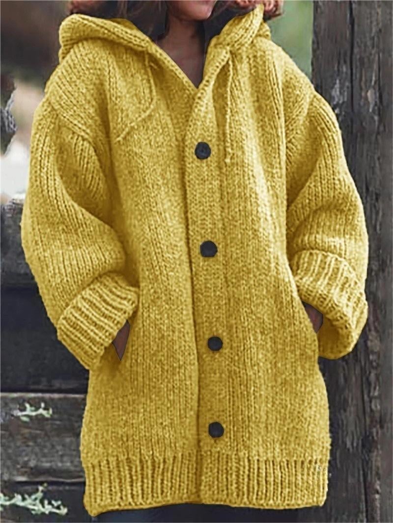 Women's oversized hooded knit cardigan in a cozy, relaxed fit for fall & winter layering.
