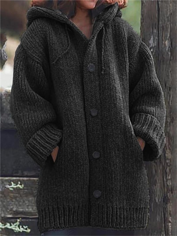 Chic women's oversized knit cardigan, a stylish and warm layering piece for cooler seasons.