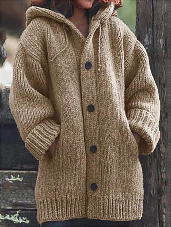Cozy women's hooded knit cardigan with an oversized fit, perfect for fall and winter fashion.